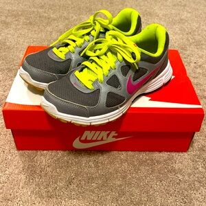 Women’s Nike Revolution in Dark Gray/Berry/Flourescent Green size 7.5